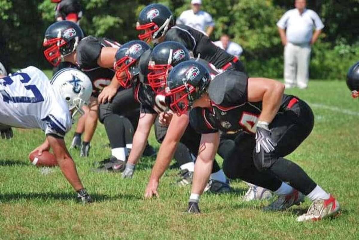 Members of the SIUE club football team play in a game in a photo from several years ago. SIUE is holding its first Club Sports Alumni Weekend on April 14-16.