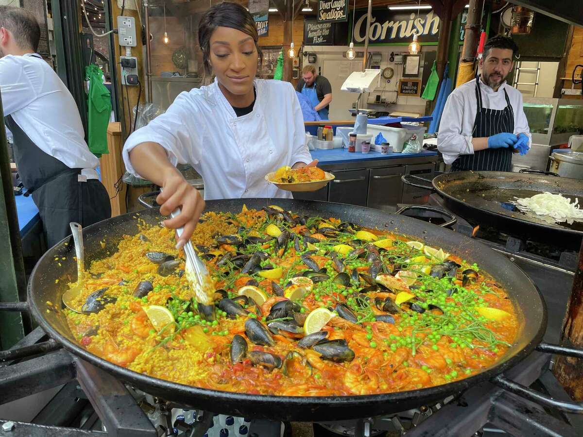 Fragrant bowls of paella are just one of the tasty offerings at Borough Market near London Bridge.