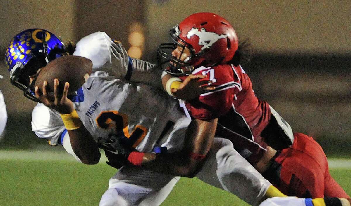 Former Channelview QB Jalen Hurts is sacked by North Shore DE Emeke Egbule during a game on Oct. 10. 2014. 