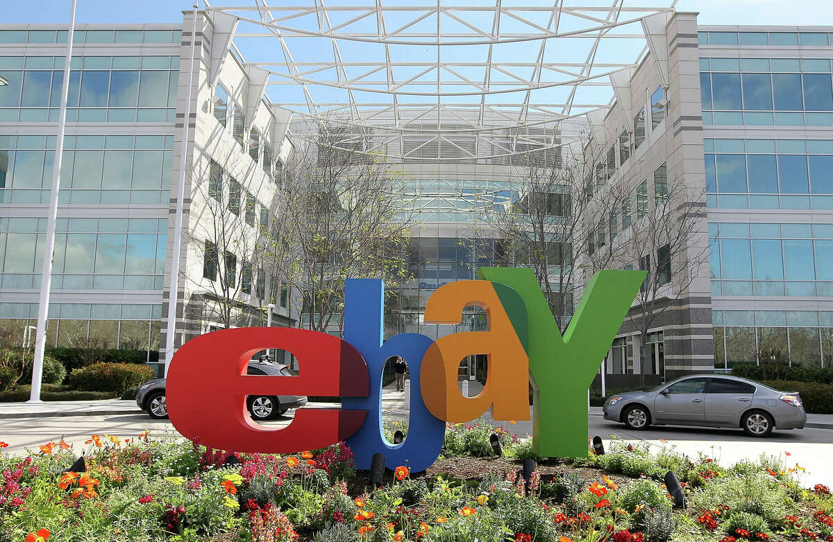 File photo of an eBay sign. EBay is cutting 185 employees from its San Jose headquarters and San Francisco office.