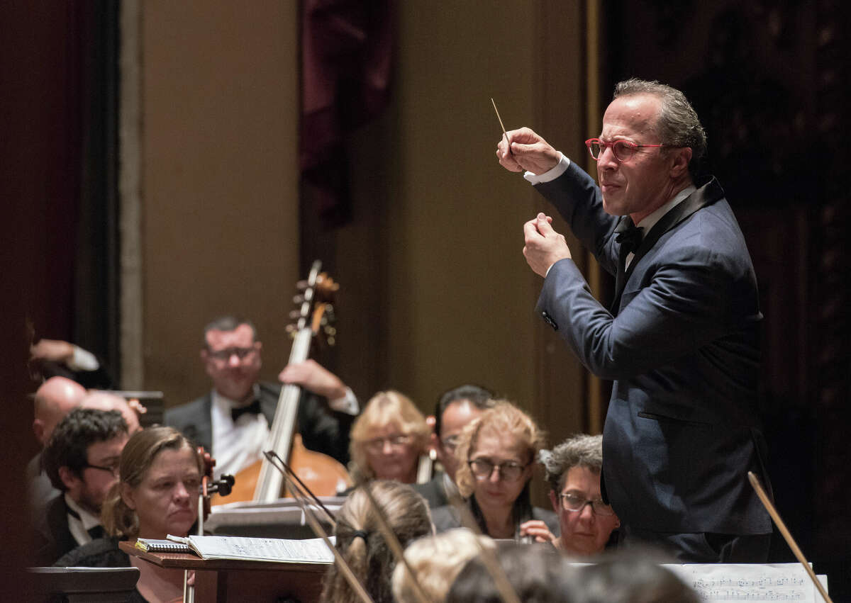 David Alan Miller, right, conducts the Albany Symphony Orchestra. (Gary Gold)