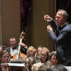 David Allen Miller, right, conducts the Albany Symphony Orchestra. (Gary Gold)
