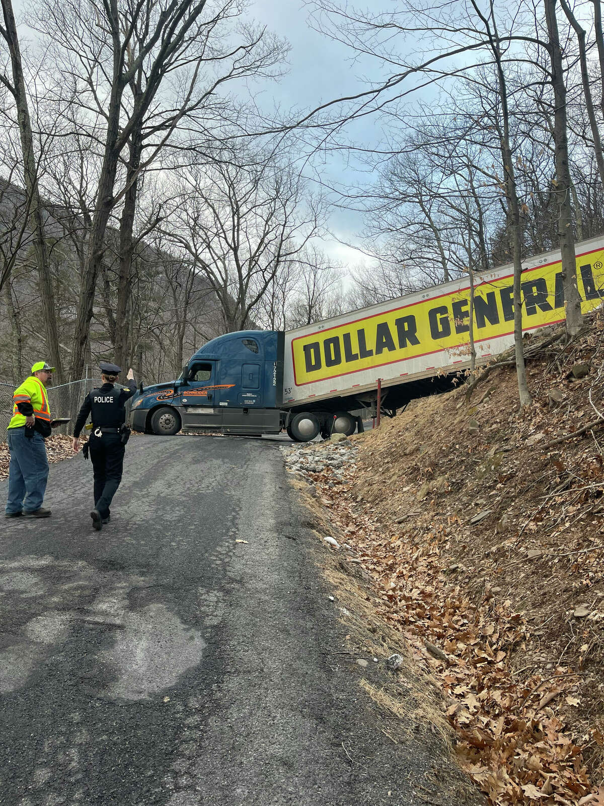 Police and a towing crew removed this truck from a seasonal Saugerties mountain road Tuesday, 24 hours after it got stuck.