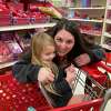 Jenna Dodd of Burnt Hills hugs her three-year-old daughter Mila. Dodd kept her son home from school the first year he was eligible for kindergarten, sending him the year he turned 6. She might do the same with Mila, who she described as shy due to the lack of early socialization because of Covid.