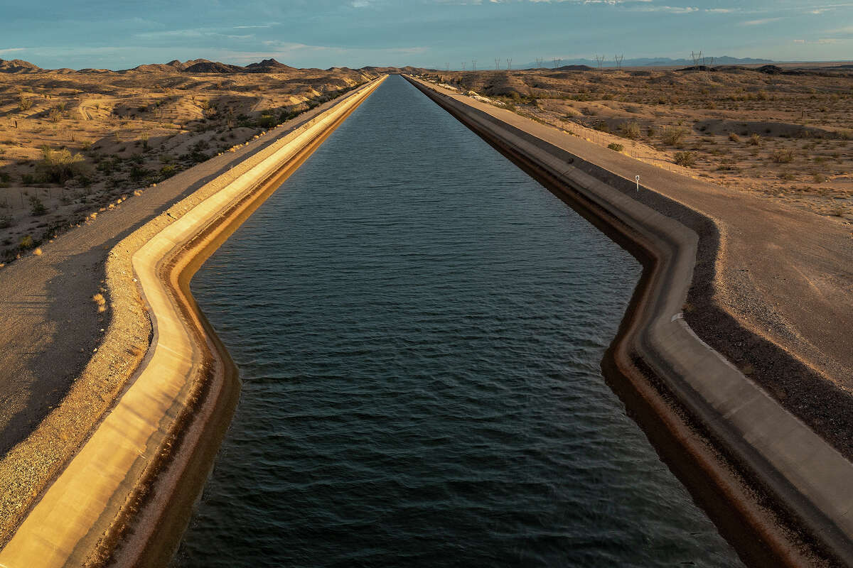 relationship The Central Arizona Project aqueduct, which transfers 456 billion gallons of Colorado River water each year to cities 336 miles away, is seen Sept. 23, 2022, near Parker, Ariz.
