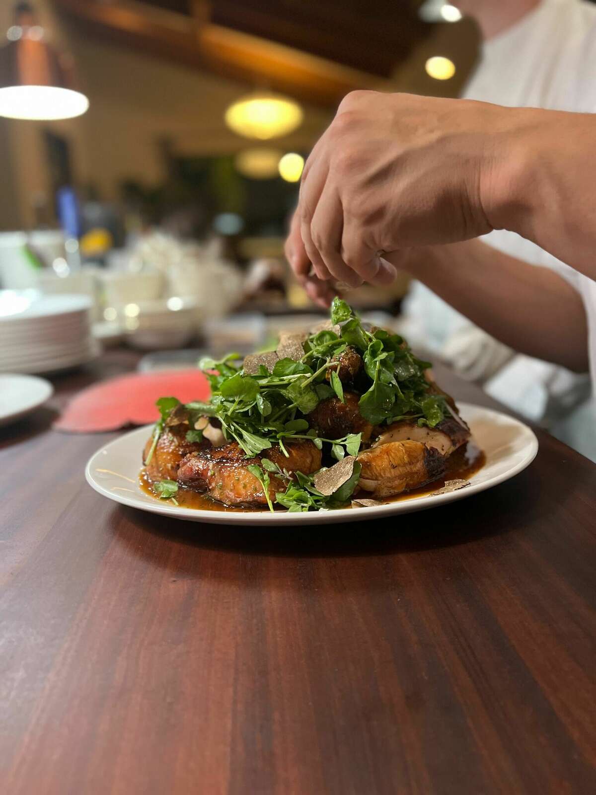 Chef Klaus Georis, a Monterey County native whose family has been in the hospitality industry for over 50 years, prepares dishes at his restaurant Maligne.