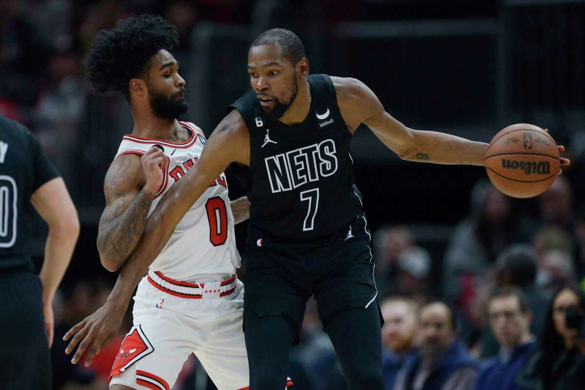 FILE - Brooklyn Nets' Kevin Durant (7) looks to drive against Chicago Bulls' Coby White (0) during the second half of an NBA basketball game Wednesday, Jan. 4, 2023, in Chicago. Chicago won 121-112. The Phoenix Suns pulled a midnight blockbuster on Wednesday, Feb. 9, 2023, acquiring 13-time All-Star Durant from the Brooklyn Nets, according to multiple reports.