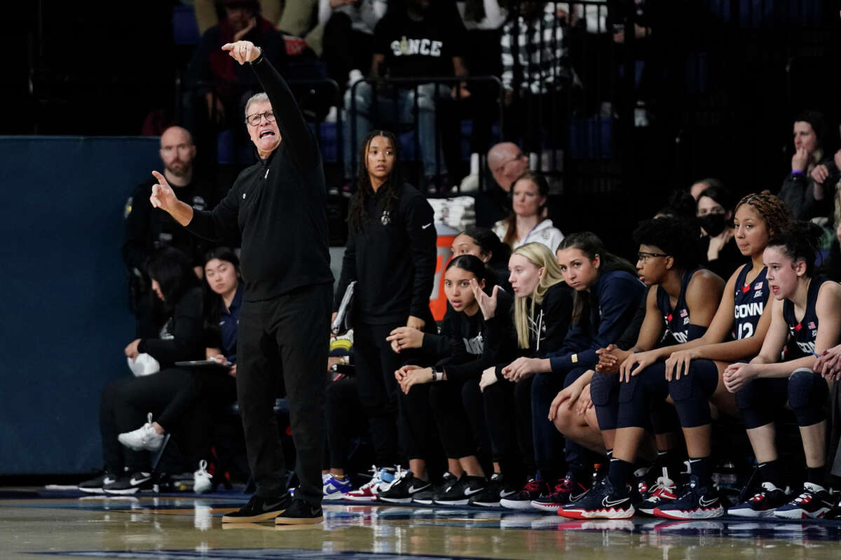 UConn head coach Geno Auriemma gestures from the sideline during the first half of an NCAA college basketball game against Marquette Wednesday, Feb. 8, 2023, in Milwaukee. (AP Photo/Aaron Gash)