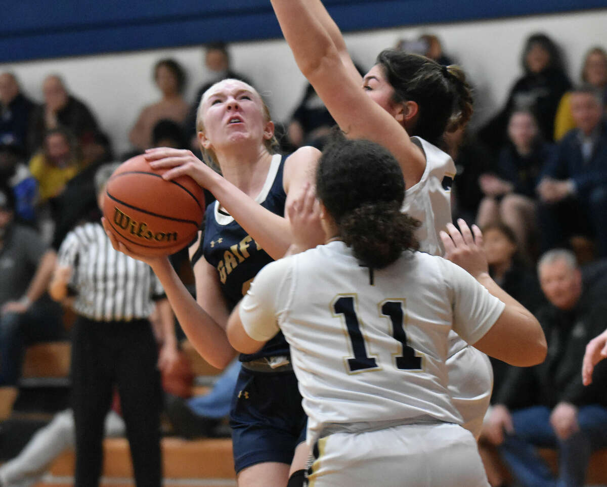 Father McGivney's Sami Oller goes up for a contested shot against Althoff in a non-conference game on Wednesday in Belleville