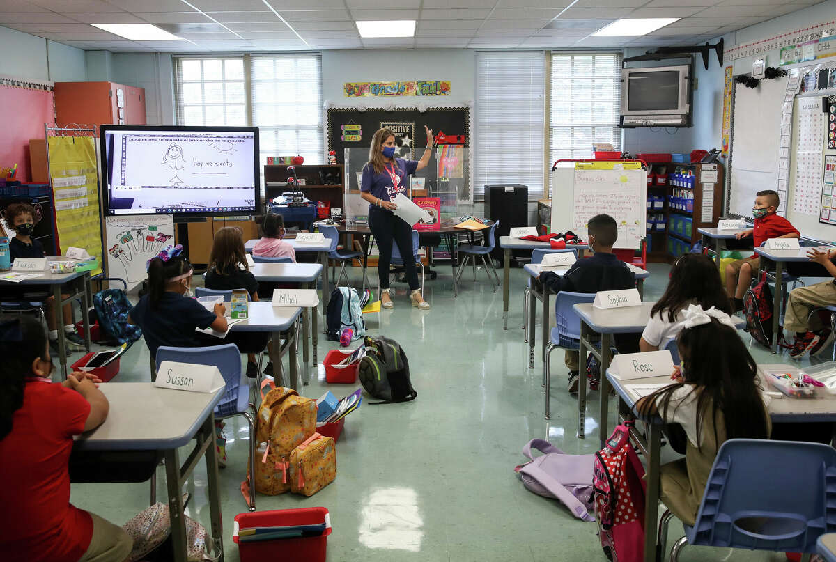 Claudia Talavera teaches her first-grade class during the first day of school in Houston Independent School District on Monday, Aug. 23, 2021, at Memorial Elementary School in Houston.