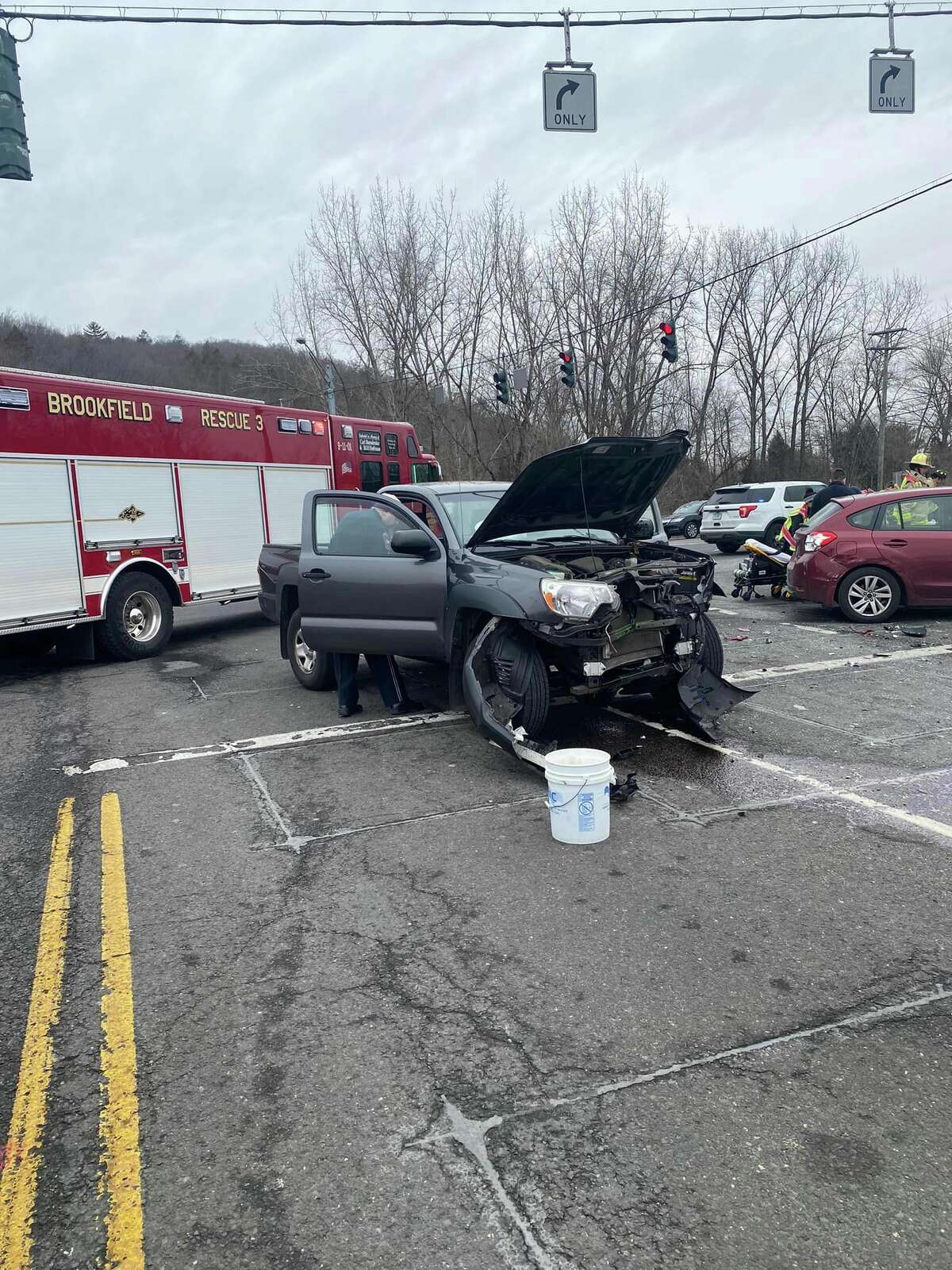 A three-car crash on Federal Road and Route 7 in Brookfield Thursday morning sent four people to the hospital, the Brookfield Volunteer Fire Company said.