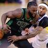 Golden State Warriors’ Gary Payton II steals the ball from Boston Celtics’ Jaylen Brown in 4th quarter of Warriors’ 104-94 win in Game 5 of NBA Finals at Chase Center in San Francisco, Calif.,, on Monday, June 13, 2022.
