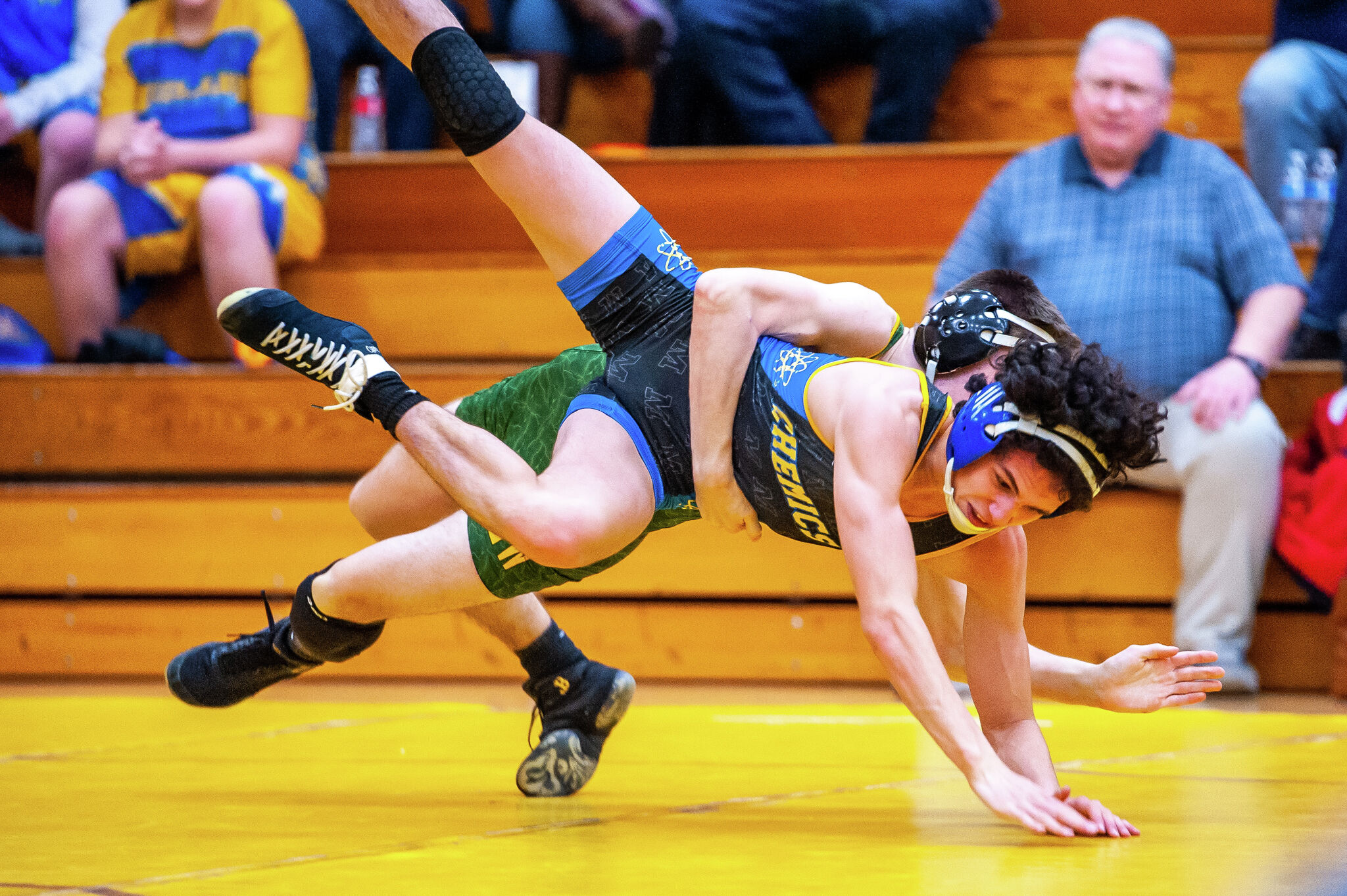 PHOTOS Dow and Midland high take part in wrestling district tournamen