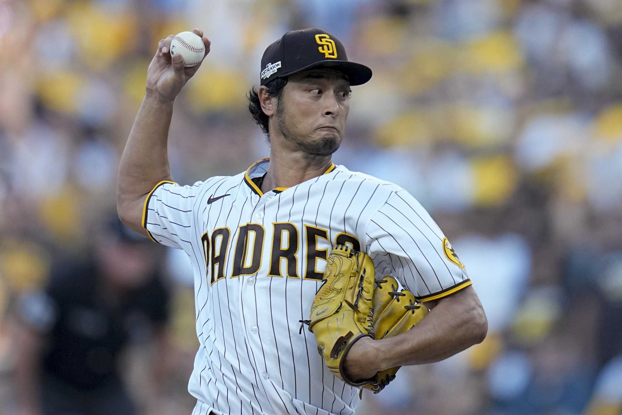 Yu Darvish fans 12, replay reversal helps Padres top Giants 3-2