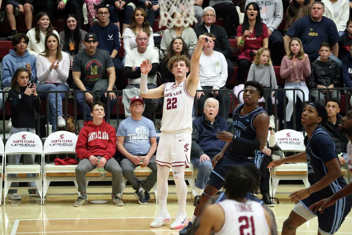 Santa Clara’s Brandin Podziemski watches his successful 3-pointer against San Diego during college basketball game at The Leavey Center in Santa Clara, Calif., on Thursday, February 9, 2023.