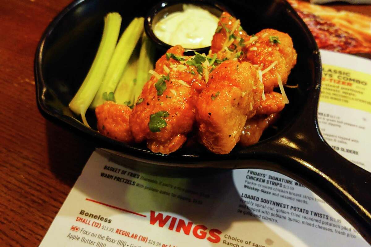 An order of "boneless chicken wings" is shown at a restaurant in Willow Grove, Pa., Wednesday, Feb. 8, 2023. With the Super Bowl at hand, behold the cheerful untruth that has been perpetrated upon (and generally with the blessing of) the chicken-consuming citizens of the United States on menus across the land: a “boneless wing” that isn’t a wing at all.