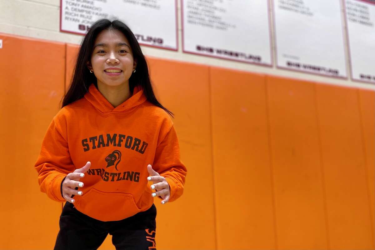 Stamford wrestler Samantha Yap, who has committed to Sacred Heart University, in Stamford's wrestling room Feb. 10, 2023.