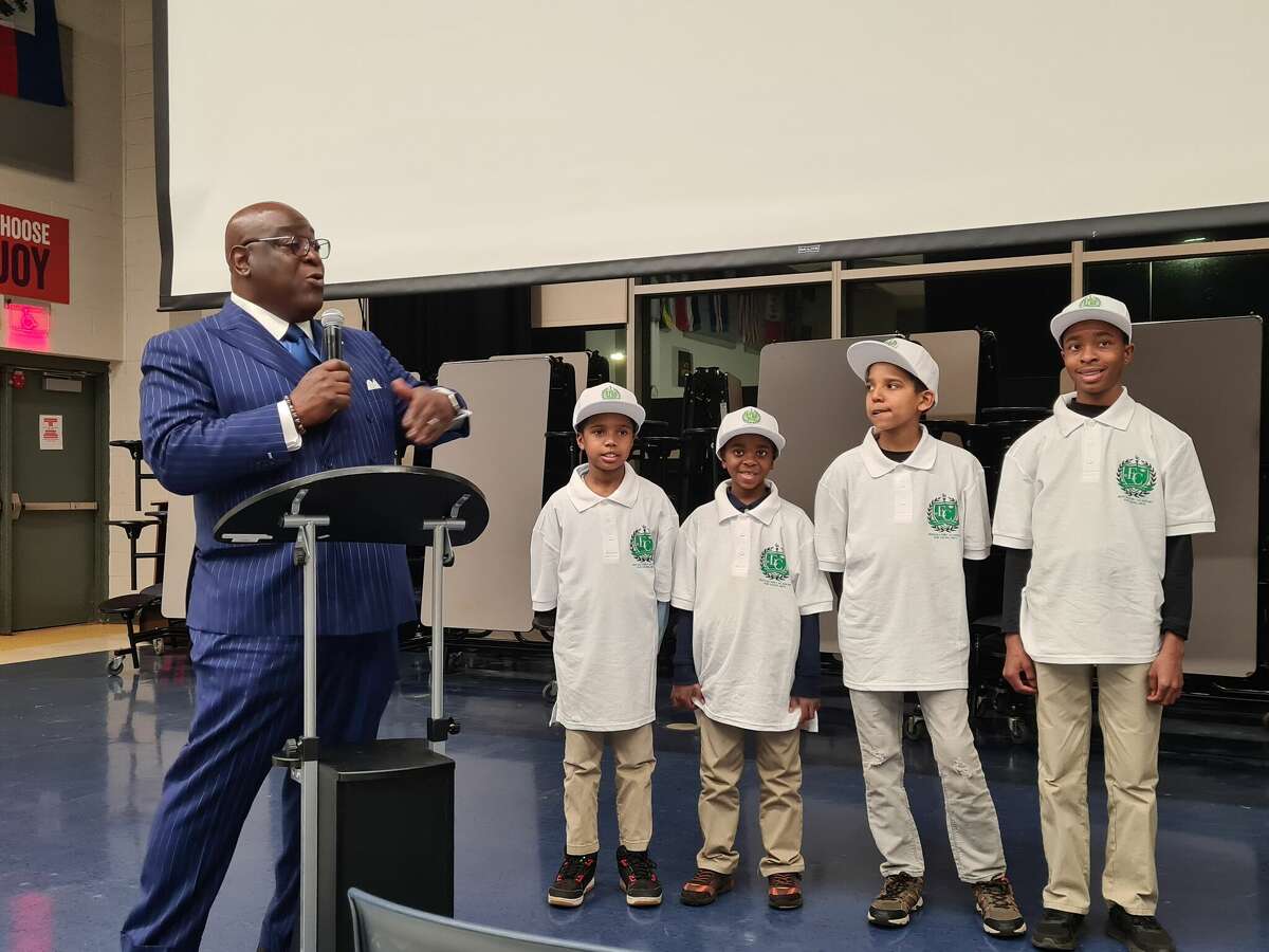 The Rev. Boise Kimber speaks about his plan for Edmonds Cofield Preparatory Academy for Young Men at Achievement First Amistad High School in New Haven Feb. 9, 2023.
