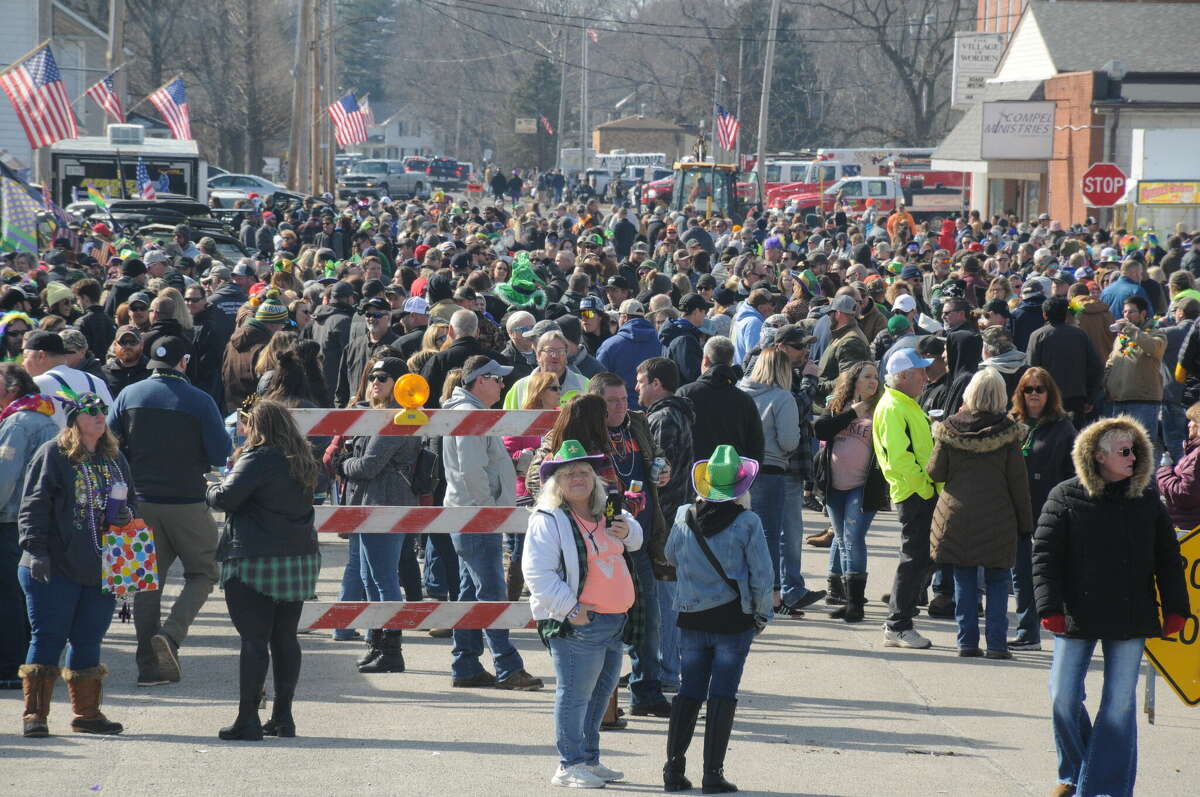 Colorful crowds filled Worden Saturday for Wordi Gras, a self-described redneck version of Mardi Gras, in 2022. On Saturday, Feb. 18, the tiny village will host the 17th Annual Wordi Gras Celebration and Parade.
