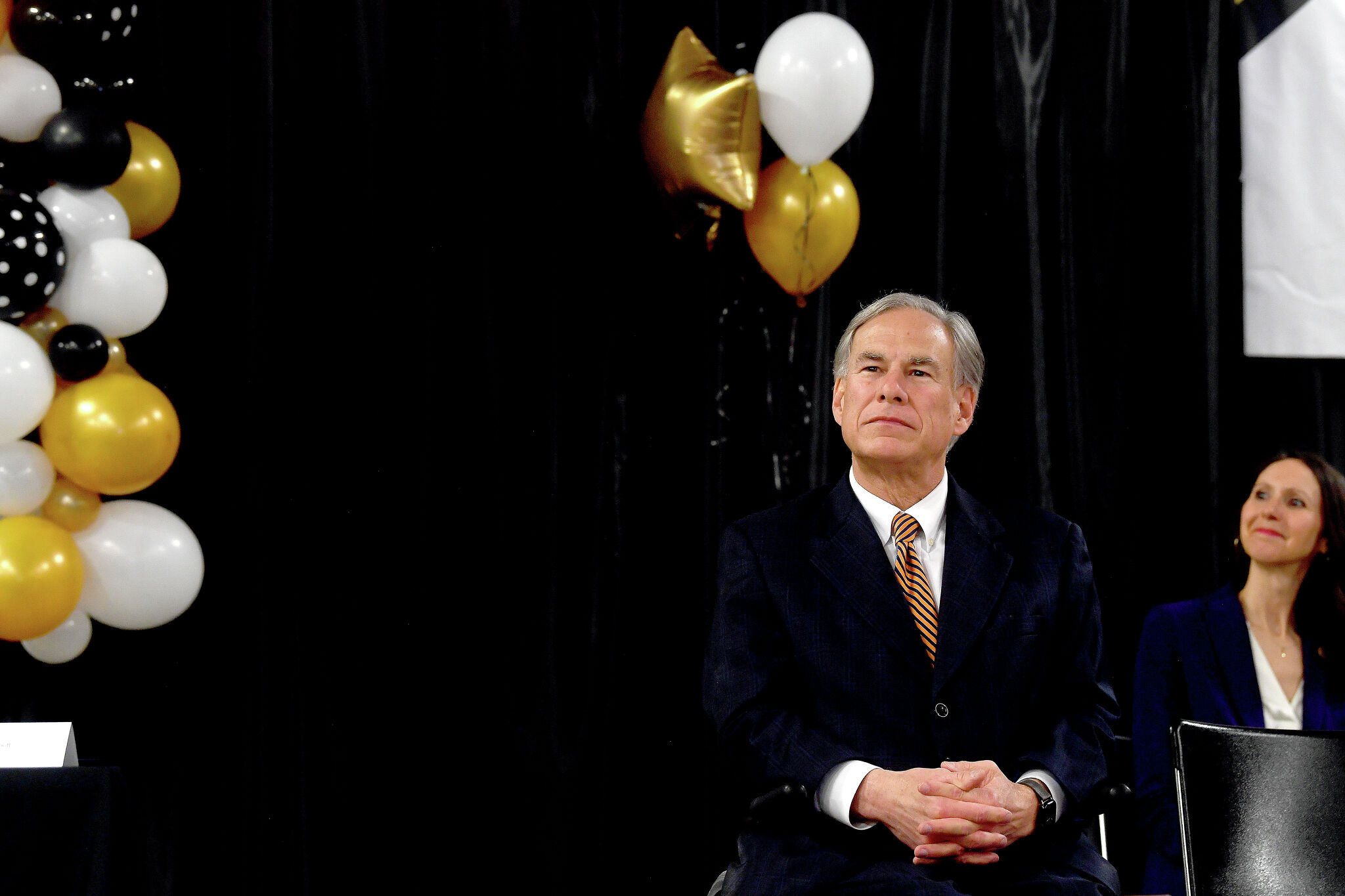 Texas Gov. Abbott poses for pictures with Astros World Series trophy