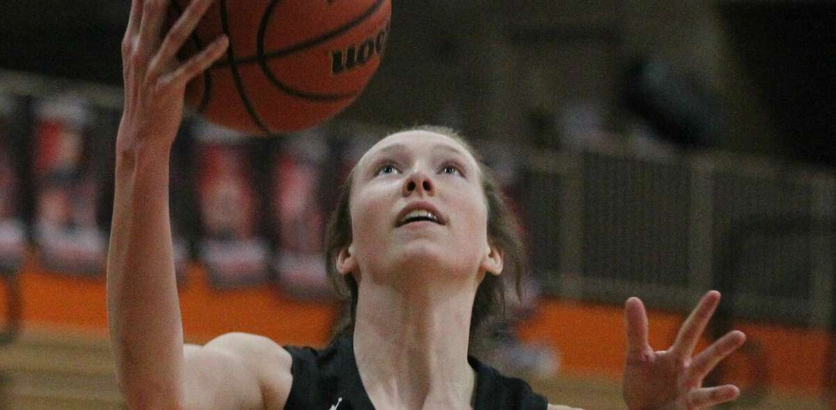 Action from the West Central girls' basketball team's win at Beardstown Thursday night