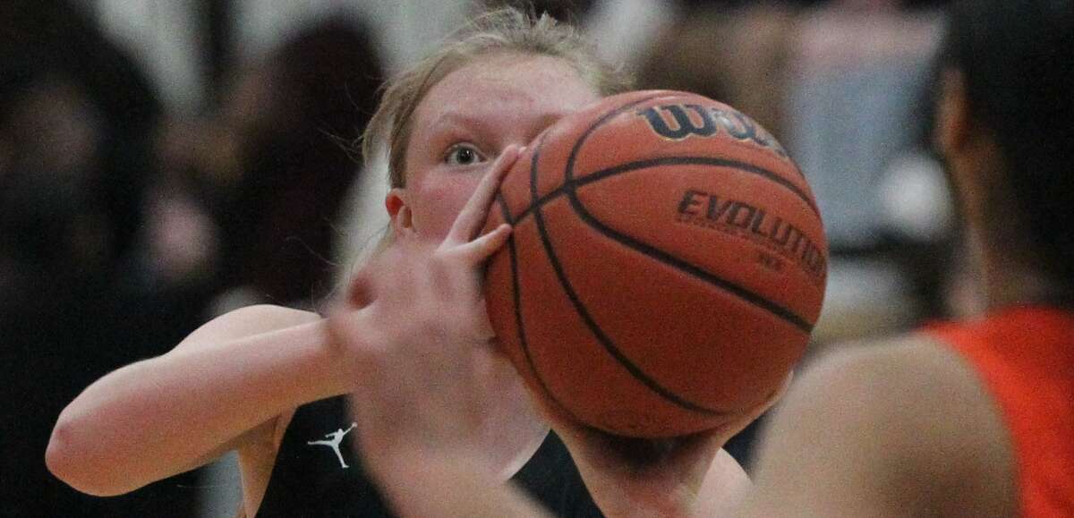 West Central's Gabby Sievers eyes the basket during a girls' basketball game at Beardstown Thursday night.