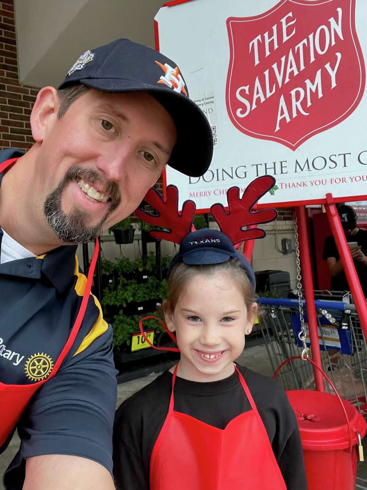 Conroe Rotarian Nick Davis is now also the Chairman of the Conroe Lake Conroe Chamber of Commerce Executive Board. He’s pictured here with his daughter, Tris, ringing the bell for the Salvation Army in December.