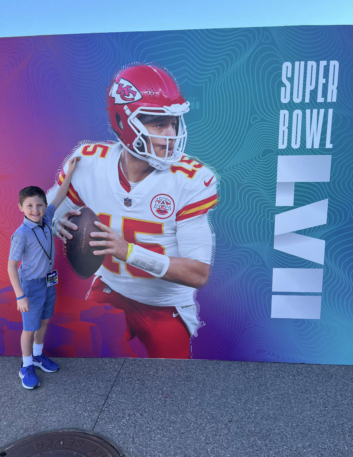Booth Garnett of Greenwich  posing in front of Patrick Mahomes' poster. (Contributed Photo/Garnett family)