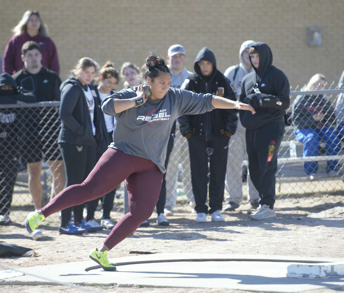 Legacy senior Leah Acosta competes in the girls shot put at the Tall City Relays, Feb. 10 at Memorial Stadium. 