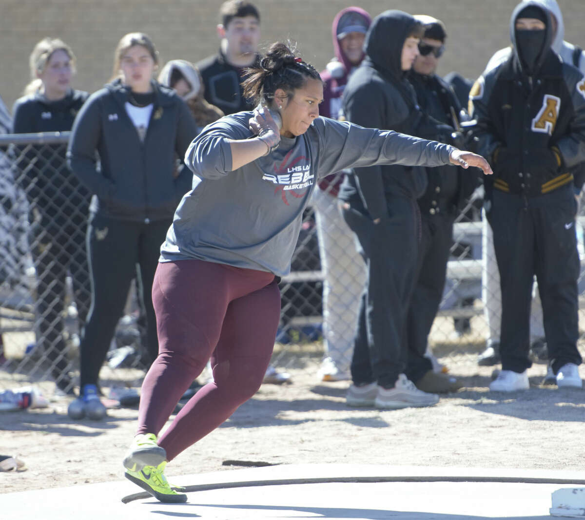 Legacy senior Leah Acosta competes in the girls shot put during the Tall City Relays, Feb. 10 at Memorial Stadium. 