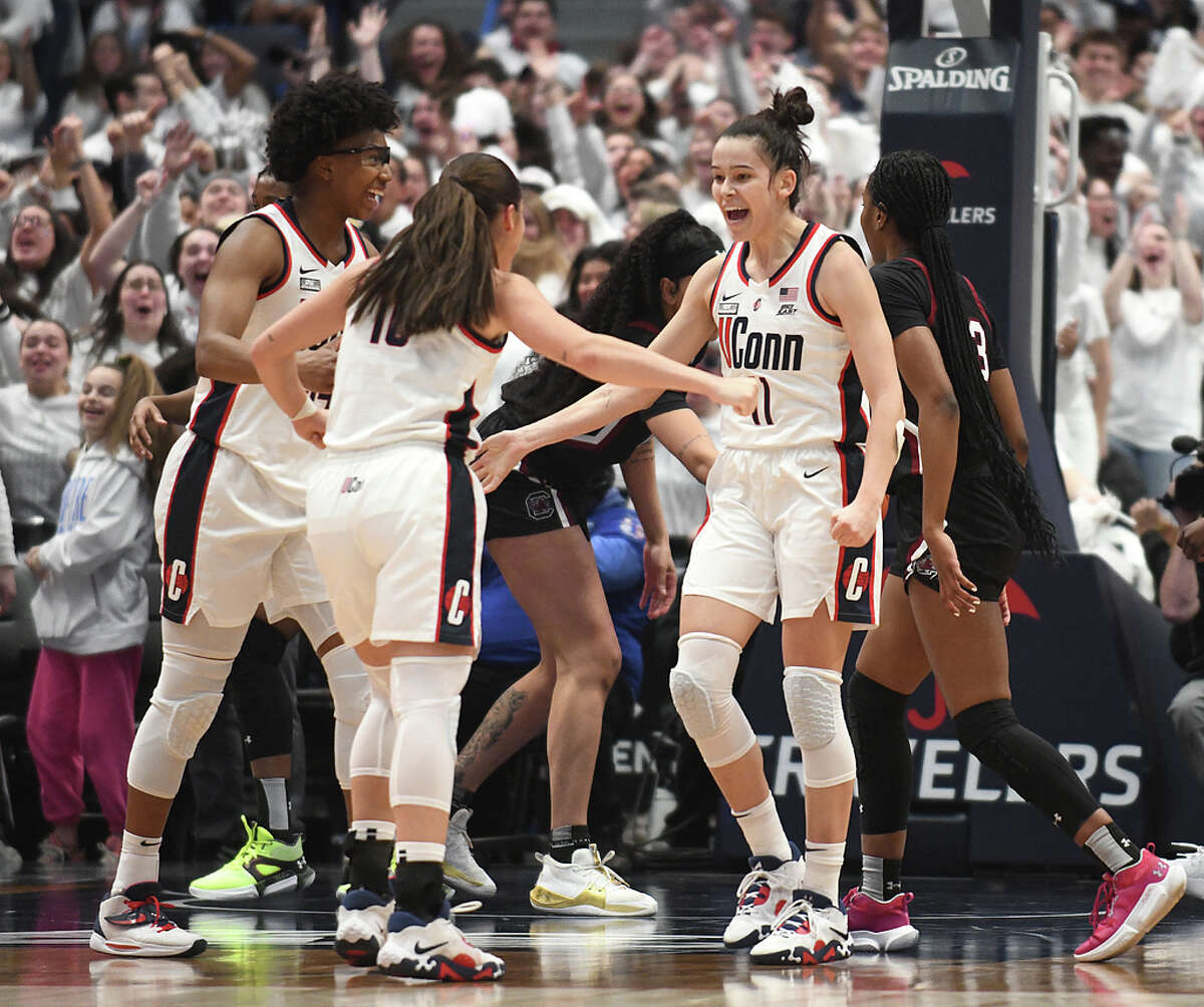 UConn's Lou Lopez S?n?chal (11) celebrates a buzzer-beating three-pointer in No. 1 South Carolina's 81-77 win over No. 5 UConn in the NCAA women's basketball game at the XL Center in Hartford, Conn. Sunday, Feb. 5, 2023.