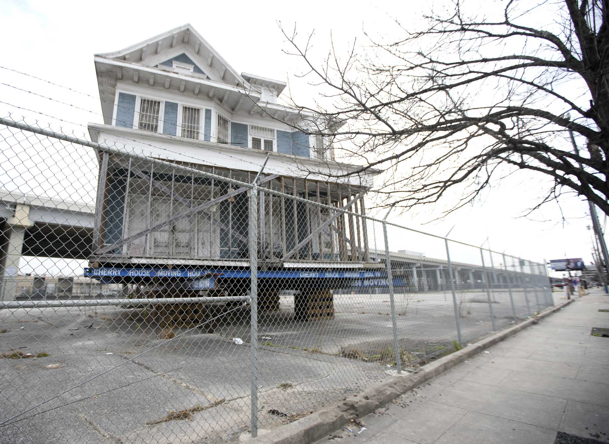 Why is the big blue Cohn house sitting in a Houston parking lot?