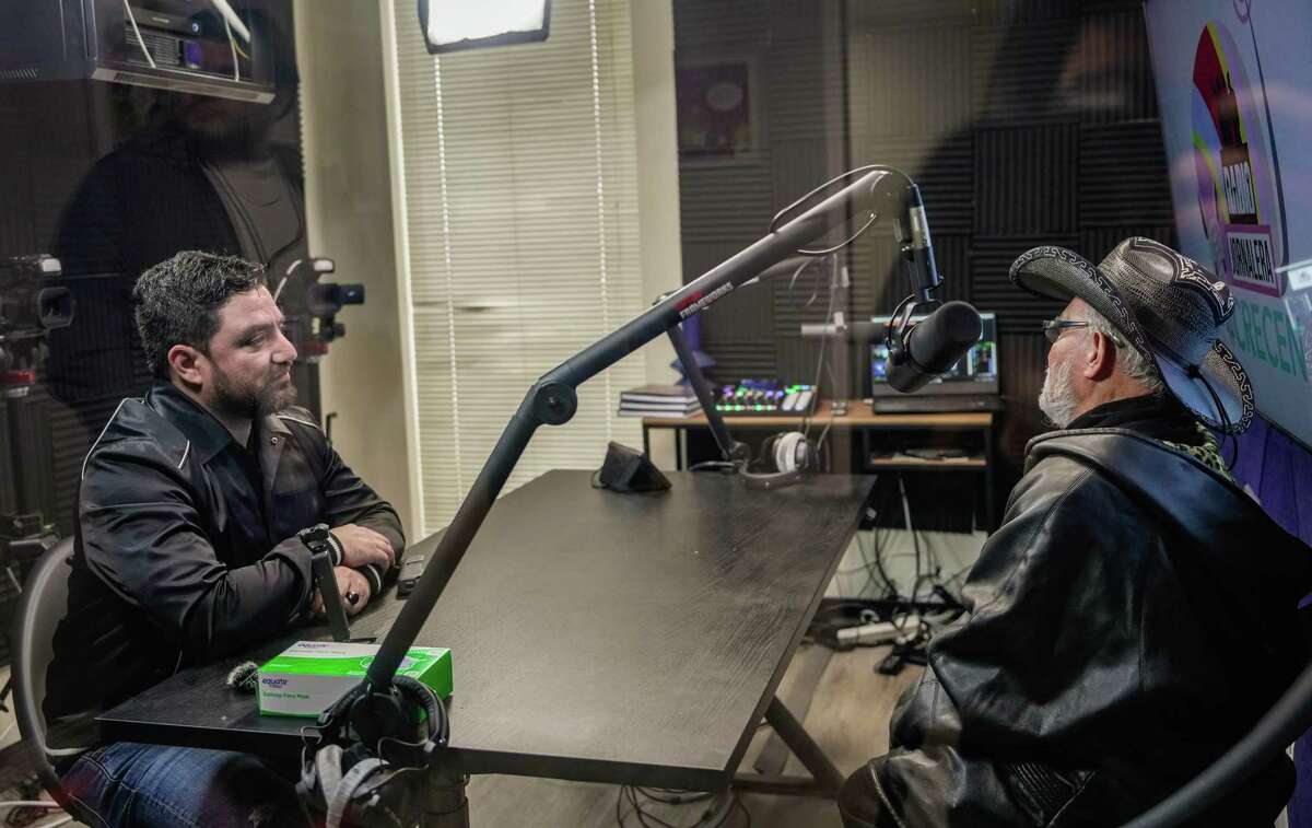 Videographer and interview host Jaime Gonzalez interviews Marco Molina, 78, from El Salvador during the launch of Radio Jornalera, a Spanish-language radio station geared towards migrant workers on Saturday, Feb. 11, 2023, in Houston.