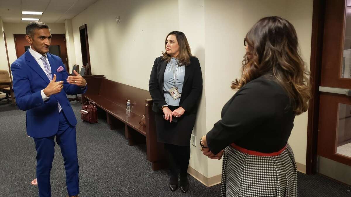 U.S. Attorney Alamdar S. Hamdani talks to Aimee Veliz, deputy in charge of the Southern District of Texas-Laredo Division, and Sara Medellin, chief deputy clerk of the Southern District of Texas, about his visit to the Gateway City.