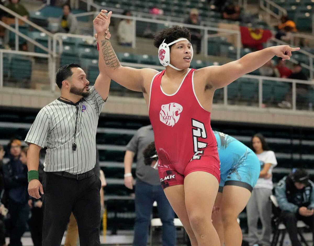 Rodney Trotter, of Katy, celebrates his win over Jarra Anderson, Katy Paetow, in the 285 weight class during Region III-6A wrestling championships at Merrell Center on Saturday, Feb. 11, 2023 in Katy.