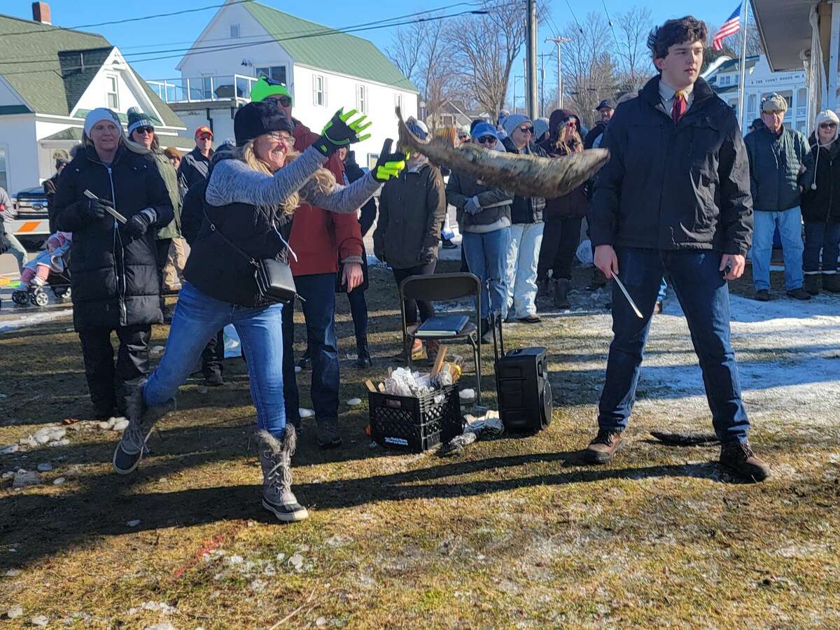 A contestant in the frozen fish toss lets a salmon fly during Beulah's Winterfest, held Feb. 11. 