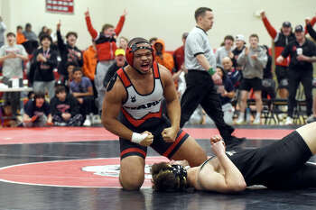 Trumbull, New Milford, Xavier claim wrestling tournament titles