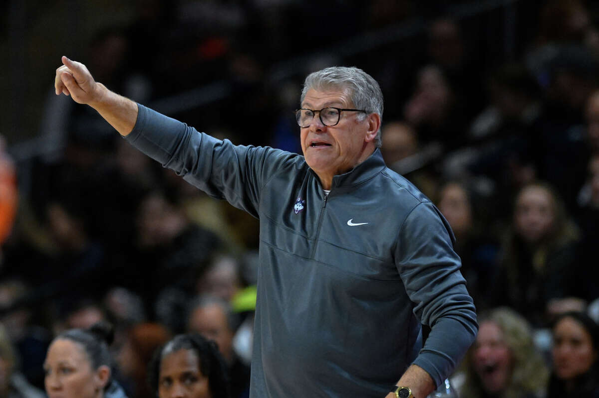 UConn head coach Geno Auriemma gives his team instructions during the second half of an NCAA college basketball game against Georgetown, Saturday, Feb. 11, 2023, in Washington. (AP Photo/Terrance Williams)
