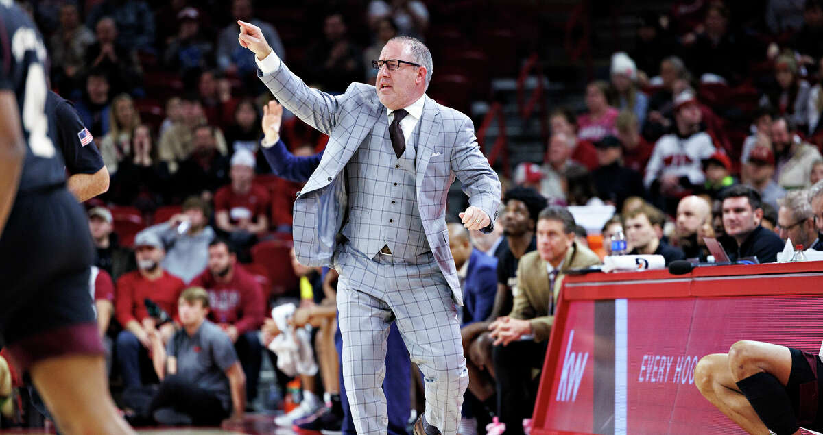 Head Coach Buzz Williams of the Texas A&M Aggies directs his team in the first half of a game against the Arkansas Razorbacks at Bud Walton Arena on January 31, 2023 in Fayetteville, Arkansas. (Photo by Wesley Hitt/Getty Images)