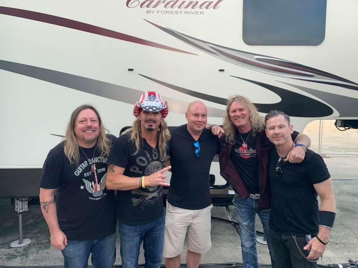Tim Morrow, executive director and CEO of the San Antonio Zoo, with Bret Michaels and band members at Go Wheels Up in San Marcos in 2019.