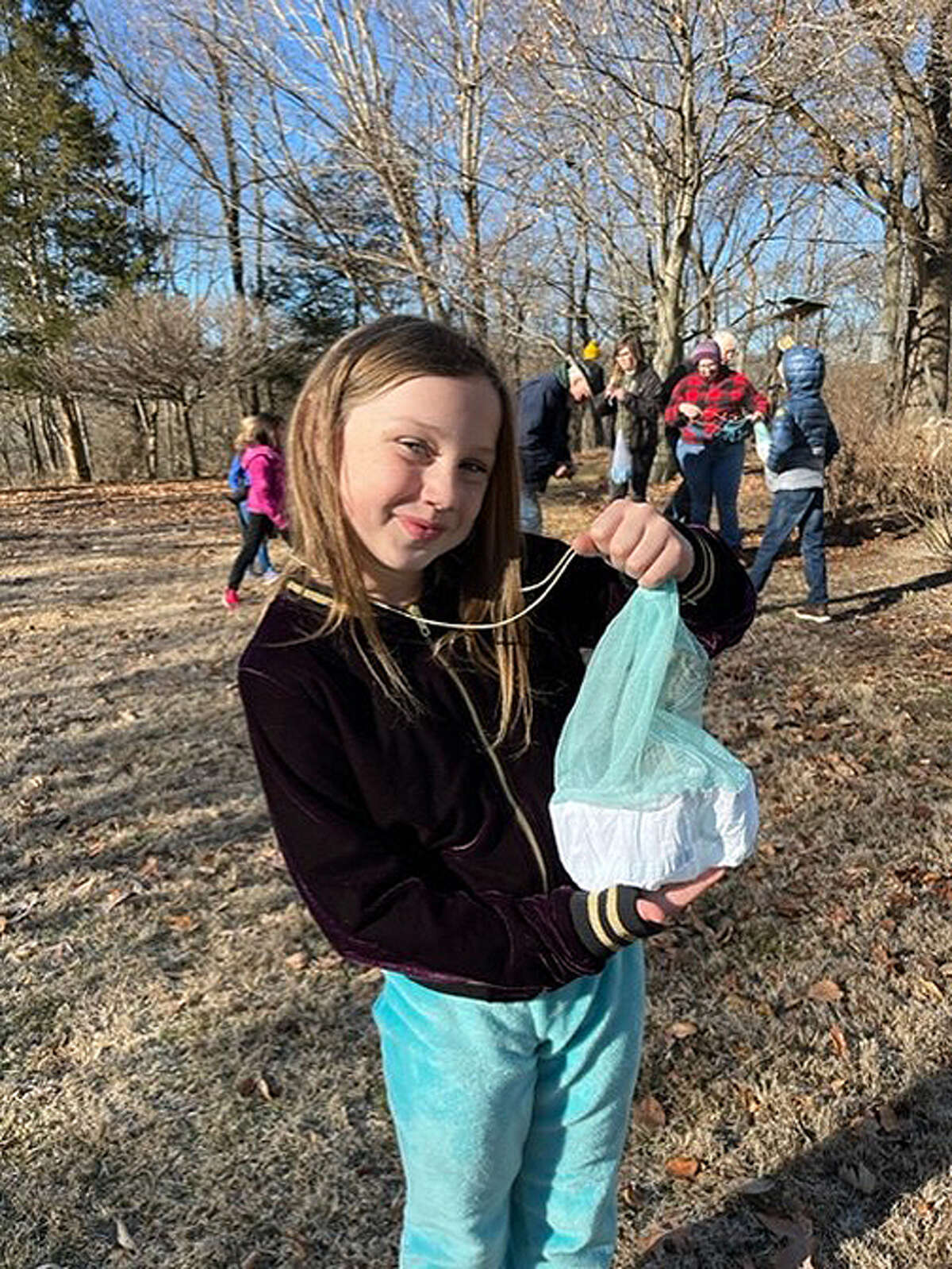 Audubon Society bird banding draws dozens of participants