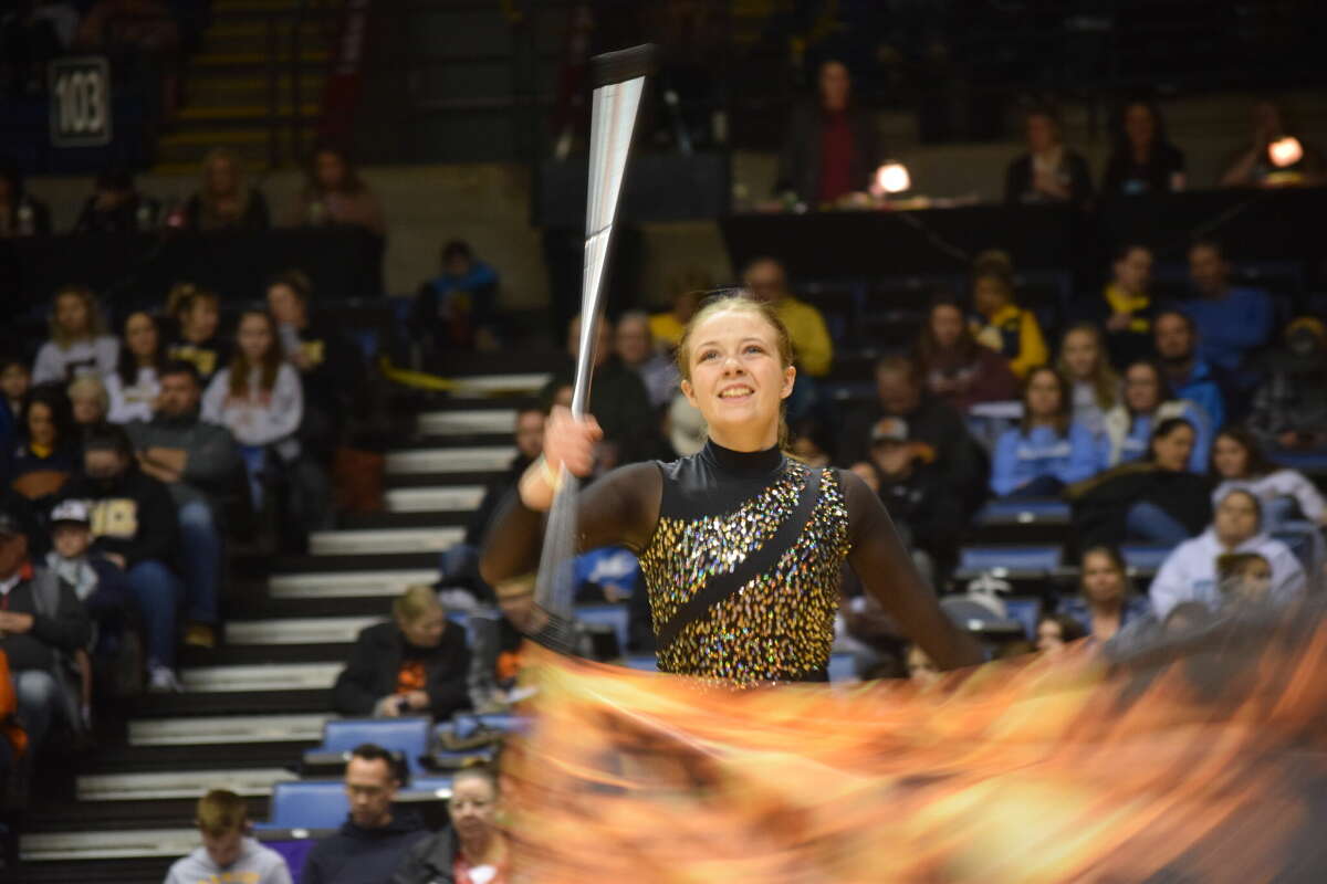 Carissa Ingram performs as a soloist, representing the Jacksonville High School Winter Guard. 