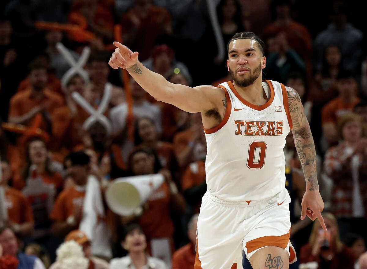 AUSTIN, TEXAS - FEBRUARY 11: Timmy Allen #0 of the Texas Longhorns reacts as his team defeats West Virginia Mountaineers 94-60 at the Moody Center on February 11, 2023 in Austin, Texas. (Photo by Chris Covatta/Getty Images)