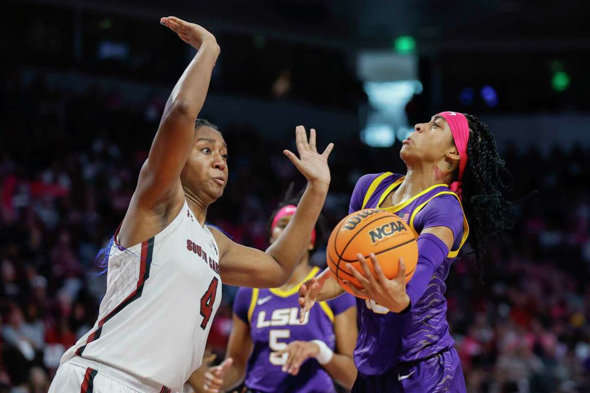 Sunday’s big NCAA matchup — No. 1 University of South Carolina against No. 3 LSU in women’s NCAA basketball on ESPN in a sold-out Colonial Life Arena — was Gaming Society’s featured women’s matchup of the weekend. LSU guard Alexis Morris, right, drives to the basket against South Carolina forward Aliyah Boston during the second half of an NCAA college basketball game in Columbia, S.C., Sunday, Feb. 12, 2023.