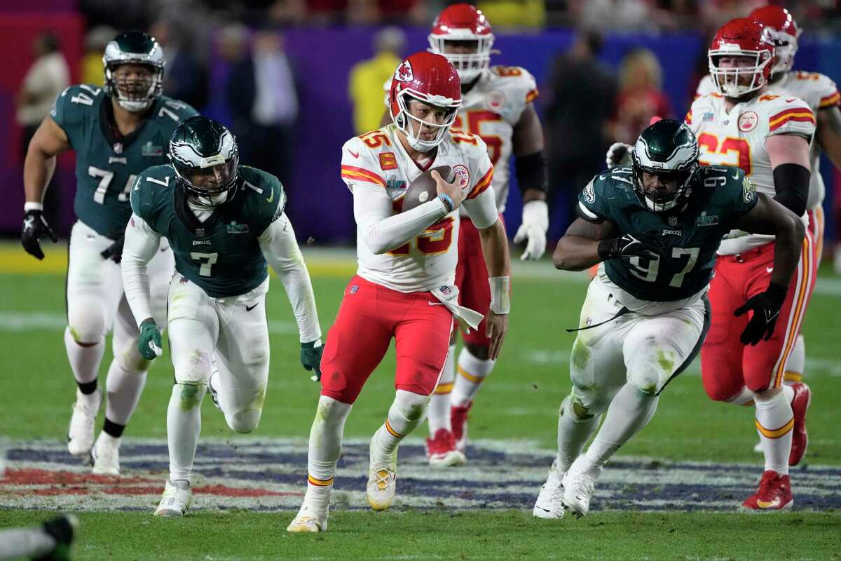 Kansas City quarterback Patrick Mahomes runs against the Philadelphia defense in the second half of Super Bowl LVII.
