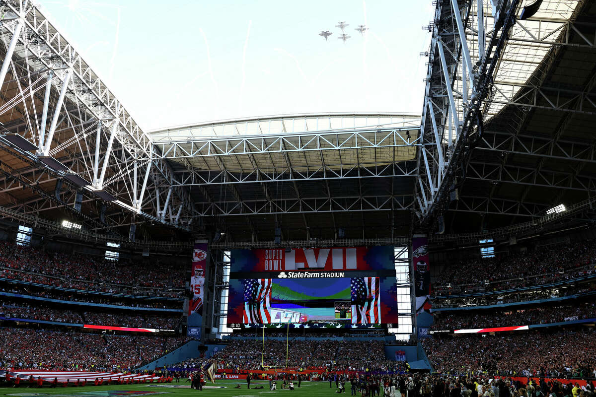 US Navy pilots perform a flyover before Super Bowl LVII between the Kansas City Chiefs and the Philadelphia Eagles at State Farm Stadium on February 12, 2023 in Glendale, Arizona.
