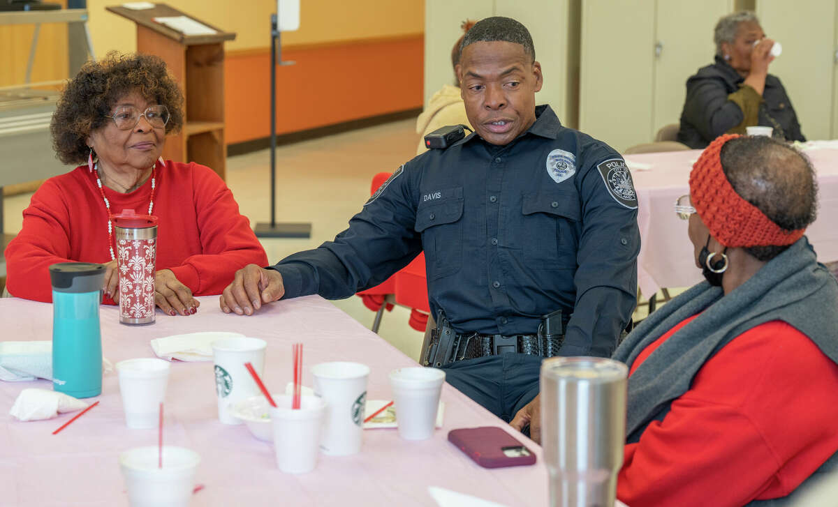 Midland Police Officer Earl Davis enjoys coffee and chatting with residents Monday morning during Coffee with a Cop at the Midland Southeast Senior Center. Photo by Tim Fischer/City of Midland