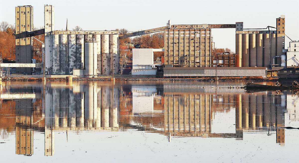John Badman|The Telegraph Alton looked like it had two Ardent mills Monday morning on a very calm Mississippi River. The reflection may be short lived with the area expecting rain and windy conditions on Tuesday, Valentines Day. On Wednesday temperatures are expected to be near 68 degrees.