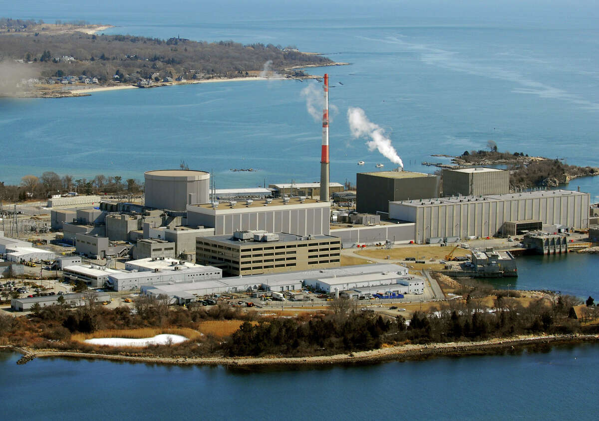 The Millstone Power Station in Waterford, through which the state directs utilities to purchase power under an agreement separate from the markets overseen by ISO New England. Gov. Ned Lamont's administration is asking the Connecticut General Assembly to give it approval to seek out more of those kinds of contracts in an effort to improve electricity prices and reliability in Connecticut and the region. (File photo by Morgan Kaolian AEROPIX)