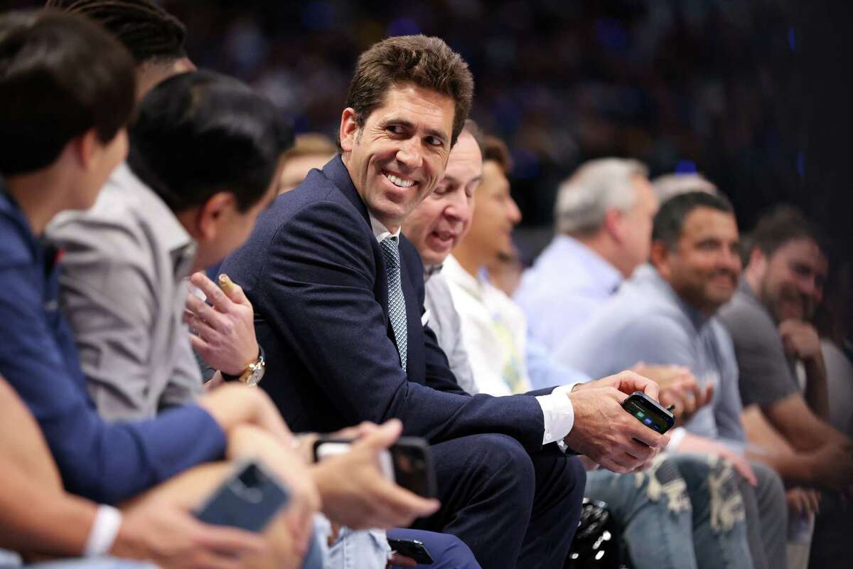 Golden State Warriors’ Bob Myers smiles in 2nd quarter of Warriors’ 109-100 win over Dallas Mavericks during Game 3 of NBA Western Conference Finals at American Airlines Center in Dallas, Texas, on Sunday, May 22, 2022.